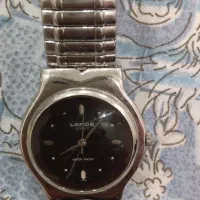 ساعت|ساعت|مشهد, فارغ التحصیلان|دیوار