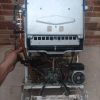 نصب و تعمیر انواع پکیج ها و نصب رادیاتور|خدمات پیشه و مهارت|قم, انسجام|دیوار