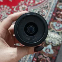 کنون r50 همراه دولنز درحد آکبند|دوربین عکاسی و فیلم‌برداری|قزوین, |دیوار