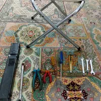 صندلی مسافرتی وتعدادی ابزاراصل