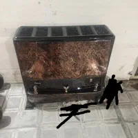 بخاری طرح شومینه طرح هخامنشی در حد نو
