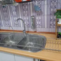 سینک استیل دوقلو و آب چکان