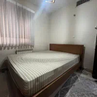 تخت دو نفره و میز آرایش از جنس چوب ( بدون تشک )