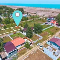 زمین-ساحلی-چسبیده-به-ساحل-درمنطقه-خوش-آب-وهواگیلان