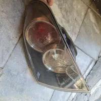 چراغ خطر مزدا ۳ سمت شاگرد