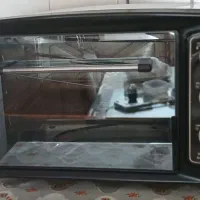 اون توستر بوش و میزتلویزیون