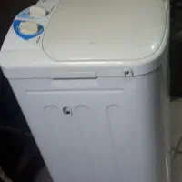 یک عدد ماشین لباس شویی مارک حایر درحد