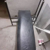 یک عدد میز پرس سینه دست ساز و یک عدد میل هالتر