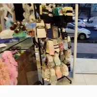 استند جوراب و بدلیجات فروشگاهی