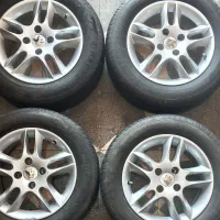 رینگ و لاستیک پنچ پر دوبل سایز ۱۵ فروش و معاوضه