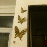 دکوری پروانه سه عدد برنز وترازو دوعدد برنز