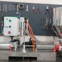 دستگاه پرکن مایعات رقیق و غلیظ تمام اتومات و دستی