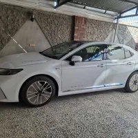 تویوتا کمری Le ژاپن هیبرید 2025