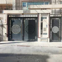در فلزی پارکینگی دولنگه لولایی جکی|مصالح و تجهیزات ساختمان|قم, قلعه یزدیها|دیوار