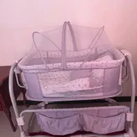 گهواره برقی ماستلا تخت کنار مادر