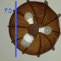 یک عدد لوستر چوبی