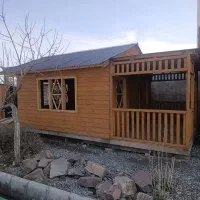 کلبه چوبی سویسی کافی‌شاپ