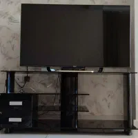 میز تلویزیون شیشه ای
