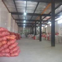 کارگر کارخانه برنجکوبی