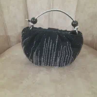 کیف نو|کیف، کفش، کمربند|قم, قلعه عموحسین|دیوار