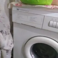 لباسشویی لوگوآمریکایی سالم