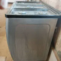 گاز پنج شعله و ساعت دیواری