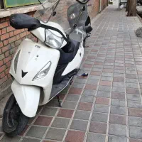 موتور سیکلت ژوپیتر سفید صحیح و سالم خش داره