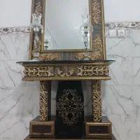 اینه وسطل اشغال با چهارتا شمعدان