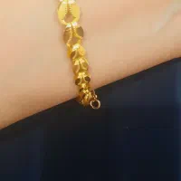 گوشوار و دستبند طلا