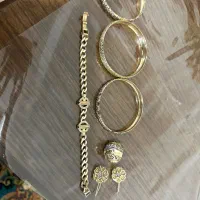 طلا۱۰۰ بالای تابلو  با فاکتور  درحد نو فوری