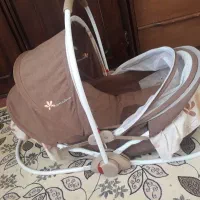 گهواره تاشو و کیسه خواب