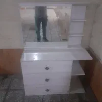 اینه کشودار