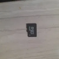 یک عدد مموری ودوتارومینگ  ویک گردن بند