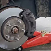 بوستر سازی و ترمزسازی تعویض لنت و بلبرینگ