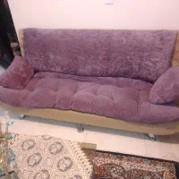 یک دست مبلمان راحتی همراه با عسلی