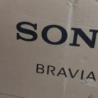 تلویزیو ن ۵۵ اینچ  ضربه خورده و کارتن سالم