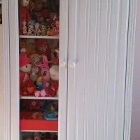 کمد لباس و عروسک کودک