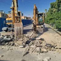 اجاره مینی بیل لاستیکی چکش وپاکت|خدمات حمل و نقل|شیراز, انجیر|دیوار