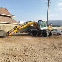 بیل میکانیکی چرخ لاستیکی|خودرو سنگین|بومهن, |دیوار