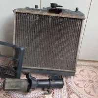 رادیاتور پراید و کمک جلو وافتابگر ویک قلم دیگر