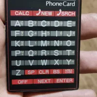 ماشین حساب و دفترچه تلفن عتیقه