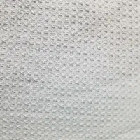 یک طاقه پارچه سفید بیسکوییتی