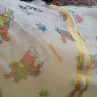 پشه بند کودک.