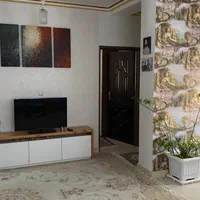 واحد۹۵.۵ متربه اضافه ۳۳متر سوئیت پشت سایت نخل زرین