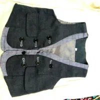 یه عدد جلیقه و دوعدد پیراهن نو