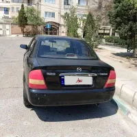 فروش فوری خودرو مزدا ۳۲۳ مشکی|خودرو سواری و وانت|تهران, تهرانسر شمالی|دیوار