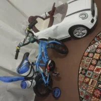 ماشین شارژی و دوچرخه