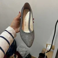 کفش|کیف، کفش، کمربند|رشت, پل تالشان|دیوار