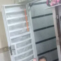 یک در و یک عدد پنجره دست دوم در حد نو