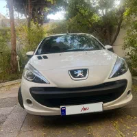 پژو۲۰۷اتوماتیک سفید مدل۹۹فرمان برقی،کمکاردرحد